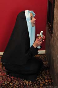image of nun in booth
